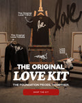 Promotional image of 'The Original Love Kit' with clothing and 'love' graffiti on a wall.